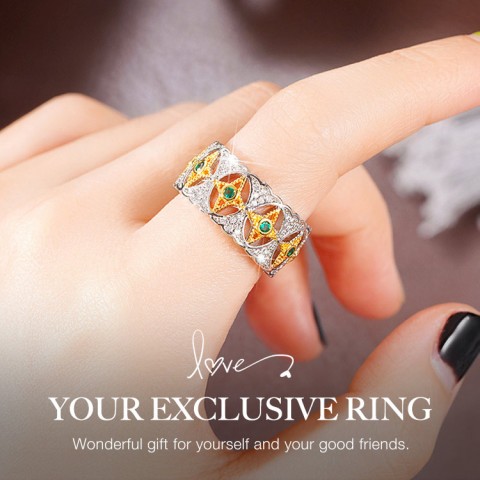 Two-tone gold Venetian teardrop green diamond ring