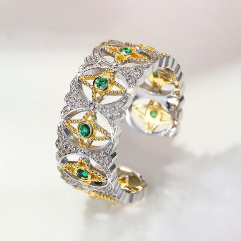 Two-tone gold Venetian teardrop green diamond ring